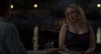 Movie still from “Before Midnight” (2013), directed by Richard Linklater – A woman sitting at a table in front of a man; Medium shot, Over the shoulder angle