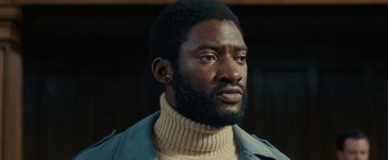 Movie still from “Small Axe” (2020), directed by Steve McQueen – A person with a beard; Close Up shot, Low angle