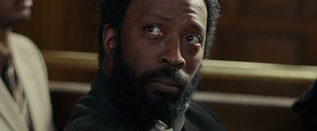 Movie still from “Small Axe” (2020), directed by Steve McQueen – A person with a beard; Close Up shot, Low angle