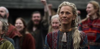 Movie still from “Vikings: Valhalla” (2022), created by Jeb Stuart – A group of people standing in front of each other; Close Up shot, Low angle