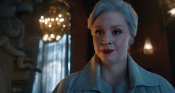 Movie still from “Wednesday” (2022), created by Miles Millar – A person wearing a jacket; Close Up shot, Over the shoulder angle