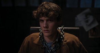 Movie still from “Wednesday” (2022), created by Miles Millar – Close Up shot, High angle