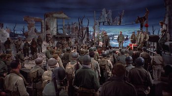 Movie still from “White Christmas” (1954), directed by Michael Curtiz – A group of men standing in front of an audience; Wide shot, High angle
