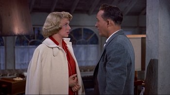Movie still from “White Christmas” (1954), directed by Michael Curtiz – A man and a woman talking to each other; Medium shot, Over the shoulder angle