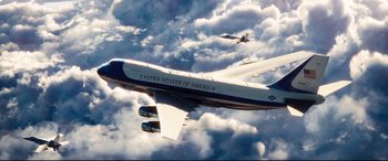 Movie still from “White House Down” (2013), directed by Roland Emmerich – A united states of america plane flying in the sky; Extreme Wide shot, Low angle