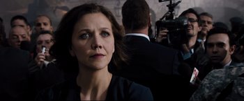 Movie still from “White House Down” (2013), directed by Roland Emmerich – A person with a camera; Close Up shot, Over the shoulder angle