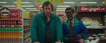 Movie still from “White Noise” (2022), directed by Noah Baumbach – Medium shot, Low angle