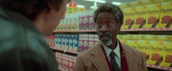 Movie still from “White Noise” (2022), directed by Noah Baumbach – Close Up shot, Over the shoulder angle