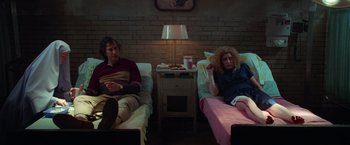 Movie still from “White Noise” (2022), directed by Noah Baumbach – Medium shot, Low angle