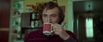 Movie still from “White Noise” (2022), directed by Noah Baumbach – Close Up shot, Low angle