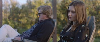 Movie still from “Windfall” (2022), directed by Charlie McDowell – A man and a woman sitting on a bench; Close Up shot, Over the shoulder angle