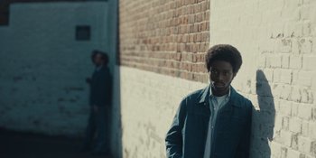 Movie still from “Small Axe” (2020), directed by Steve McQueen – Medium shot, Over the shoulder angle