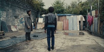 Movie still from “Small Axe” (2020), directed by Steve McQueen – Wide shot, Over the shoulder angle