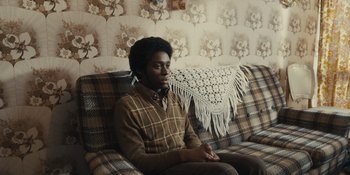 Movie still from “Small Axe” (2020), directed by Steve McQueen – Medium shot, High angle