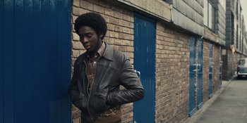 Movie still from “Small Axe” (2020), directed by Steve McQueen – Medium shot, Over the shoulder angle