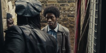 Movie still from “Small Axe” (2020), directed by Steve McQueen – Medium shot, Over the shoulder angle