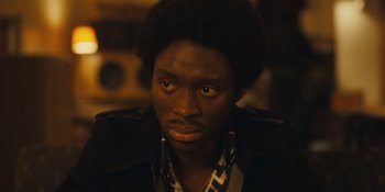 Movie still from “Small Axe” (2020), directed by Steve McQueen – Close Up shot, Over the shoulder angle