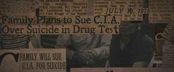 Movie still from “Wormwood” (2017), directed by Errol Morris – Newspaper clippings of a person in a black and white photo; Extreme Close Up shot, Overhead angle