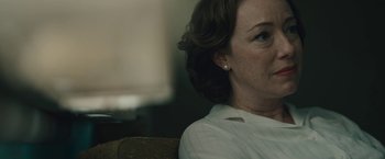 Movie still from “Wormwood” (2017), directed by Errol Morris – A person sitting in a chair; Close Up shot, Over the shoulder angle