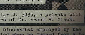 Movie still from “Wormwood” (2017), directed by Errol Morris – Image of a newspaper article; Extreme Close Up shot, Overhead angle