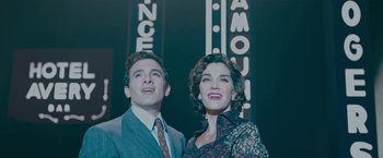 Movie still from “Wormwood” (2017), directed by Errol Morris – A man and a woman standing next to each other; Medium shot, Low angle