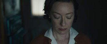 Movie still from “Wormwood” (2017), directed by Errol Morris – A person with her eyes closed; Close Up shot, High angle