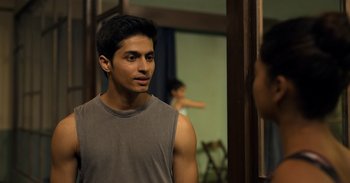 Movie still from “Yeh Ballet” (2020), directed by Sooni Taraporevala – A man standing in front of a bathroom mirror; Close Up shot, Over the shoulder angle