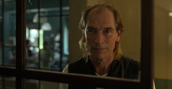 Movie still from “Yeh Ballet” (2020), directed by Sooni Taraporevala – A man with long blonde hair looking into a mirror; Close Up shot, Over the shoulder angle