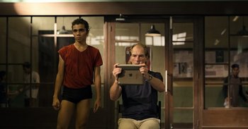 Movie still from “Yeh Ballet” (2020), directed by Sooni Taraporevala – A man taking a picture of himself with his ipad; Medium shot, Over the shoulder angle