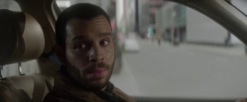 Movie still from “tick, tick... BOOM!” (2021), directed by Lin-Manuel Miranda – A person sitting in a car; Close Up shot, Over the shoulder angle