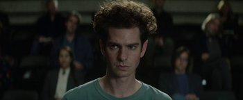 Movie still from “tick, tick... BOOM!” (2021), directed by Lin-Manuel Miranda – A person wearing a green shirt; Close Up shot, Over the shoulder angle