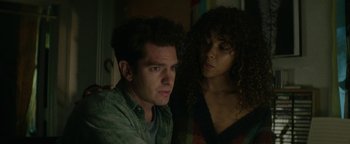 Movie still from “tick, tick... BOOM!” (2021), directed by Lin-Manuel Miranda – A man and a woman are looking at the camera; Close Up shot, Over the shoulder angle