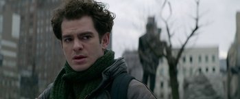 Movie still from “tick, tick... BOOM!” (2021), directed by Lin-Manuel Miranda – A person wearing a scarf; Close Up shot, Over the shoulder angle