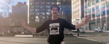 Movie still from “tick, tick... BOOM!” (2021), directed by Lin-Manuel Miranda – A man standing in the middle of the street; Medium shot, Low angle