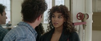 Movie still from “tick, tick... BOOM!” (2021), directed by Lin-Manuel Miranda – A man and a woman looking at each other in a mirror; Close Up shot, Over the shoulder angle