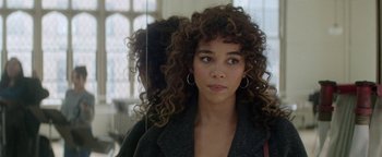 Movie still from “tick, tick... BOOM!” (2021), directed by Lin-Manuel Miranda – A person with curly hair; Close Up shot, Over the shoulder angle