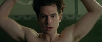 Movie still from “tick, tick... BOOM!” (2021), directed by Lin-Manuel Miranda – A person in a room; Close Up shot, Low angle