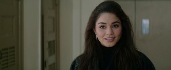 Movie still from “tick, tick... BOOM!” (2021), directed by Lin-Manuel Miranda – A beautiful young woman with long brown hair; Close Up shot, Over the shoulder angle