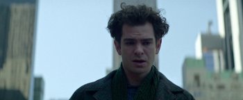 Movie still from “tick, tick... BOOM!” (2021), directed by Lin-Manuel Miranda – A young man with curly brown hair wearing a green jacket; Close Up shot, Low angle