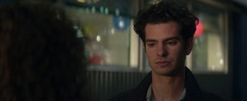 Movie still from “tick, tick... BOOM!” (2021), directed by Lin-Manuel Miranda – A person wearing a jacket; Close Up shot, Over the shoulder angle