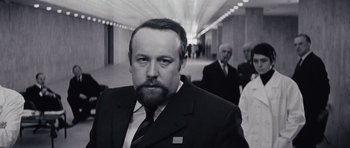 Movie still from “Solaris” (1972), directed by Andrei Tarkovsky – Black and white photograph of a man in a suit and tie; Close Up shot, Low angle