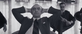 Movie still from “Solaris” (1972), directed by Andrei Tarkovsky – Black and white photograph of a man in a suit and tie; Close Up shot, Low angle