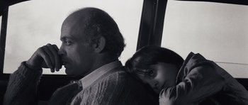 Movie still from “Solaris” (1972), directed by Andrei Tarkovsky – An older man and a young girl on a bus; Close Up shot, Low angle