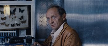 Movie still from “Solaris” (1972), directed by Andrei Tarkovsky – An older man wearing a leather jacket and looking at the camera; Close Up shot, Low angle