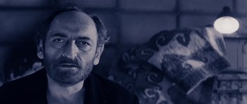 Movie still from “Solaris” (1972), directed by Andrei Tarkovsky – A person wearing a jacket; Close Up shot, Low angle