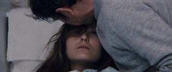 Movie still from “Solaris” (1972), directed by Andrei Tarkovsky – A man and a woman looking at each other; Close Up shot, Overhead angle