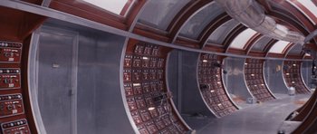 Movie still from “Solaris” (1972), directed by Andrei Tarkovsky – A wall with many different types of electronic equipment; Wide shot, High angle