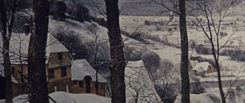 Movie still from “Solaris” (1972), directed by Andrei Tarkovsky – A snowy landscape with a tree and a house in the background; Extreme Close Up shot, High angle