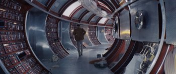 Movie still from “Solaris” (1972), directed by Andrei Tarkovsky – A man walking down a hallway in a building; Wide shot, High angle