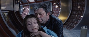 Movie still from “Solaris” (1972), directed by Andrei Tarkovsky – A man and a woman are hugging in a room; Close Up shot, High angle